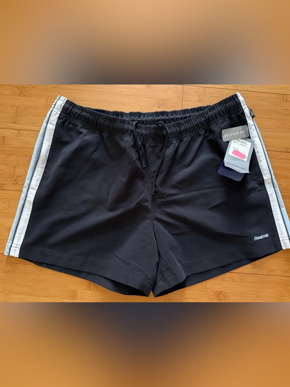 Reebok Black Shorts with White Side Stripes
